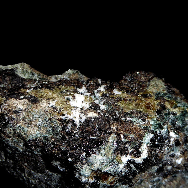 Granate Var. Hessonita, Diopsido